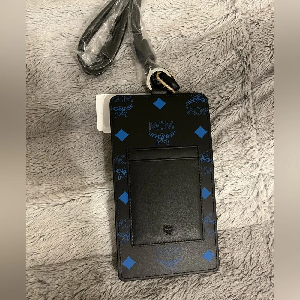 NEW NWT MCM LOGO PHONE LANYARD VALLARTA BLUE BLACK AUTHENTIC INCL SAKS TAG